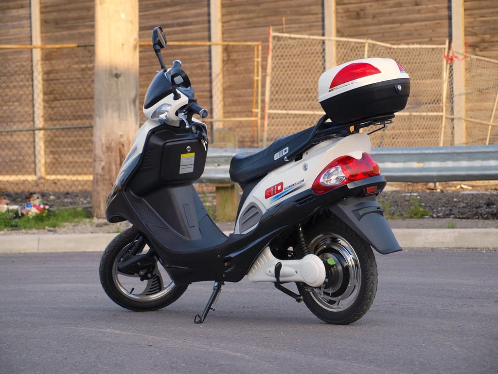 SARAZ M1 Touring electric moped at dusk