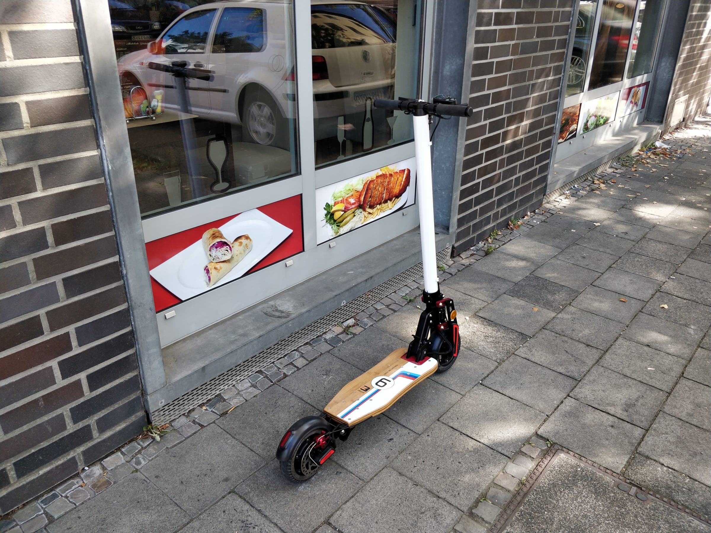 SARAZ S1 electric scooter, parked on a city street